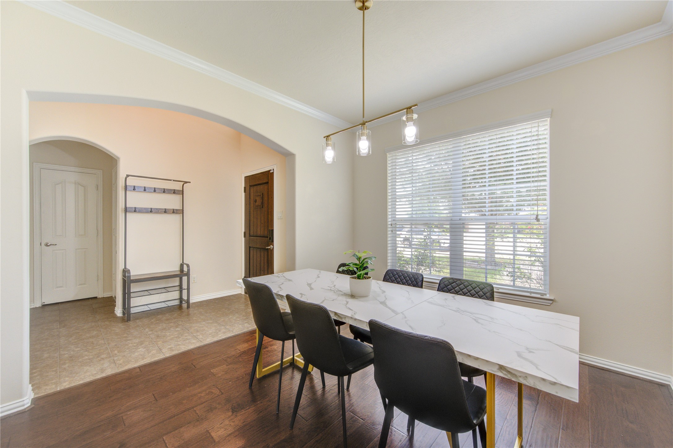 4211 Tristan Ridge Lane Katy, TX 77449 - Photo 6 of 31 a view of a dining room with furniture window and wooden floor
