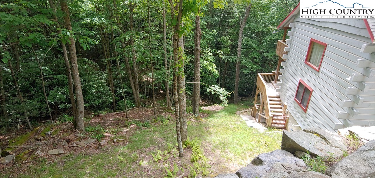 311 Jackpine Road Beech Mountain, NC 28604 - Photo 4 of 7 a view of a garden from a patio