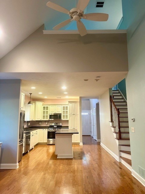 52 County Road, Unit 8 Mattapoisett, MA 02739 - Photo 12 of 19 a view of kitchen with kitchen island white cabinets and refrigerator
