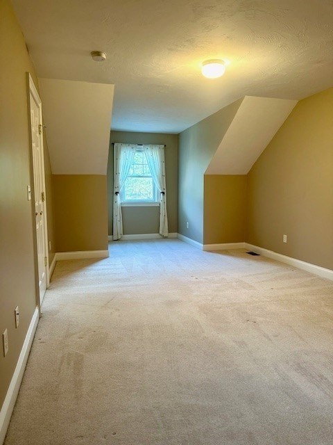 52 County Road, Unit 8 Mattapoisett, MA 02739 - Photo 15 of 19 an empty room with windows