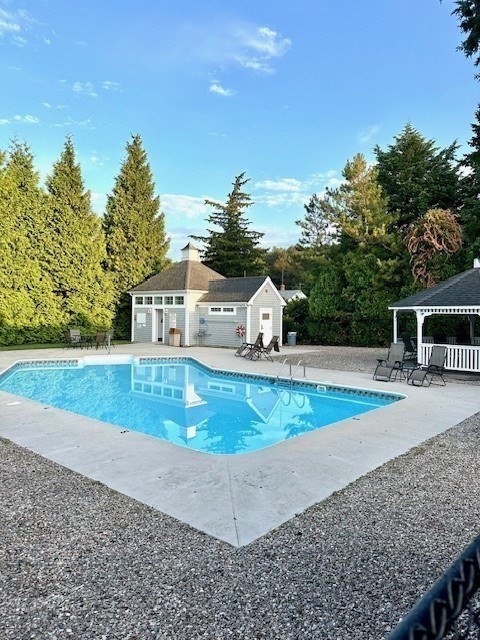 52 County Road, Unit 8 Mattapoisett, MA 02739 - Photo 18 of 19 a view of a house with a yard
