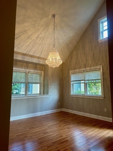 52 County Road, Unit 8 Mattapoisett, MA 02739 - Photo 6 of 19 a view of an empty room with wooden floor and a window