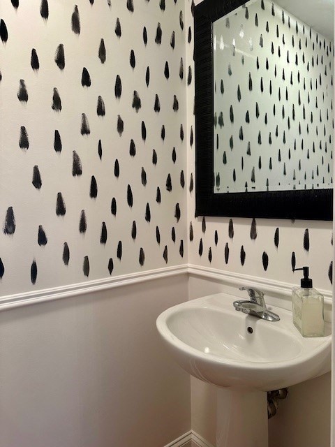 52 County Road, Unit 8 Mattapoisett, MA 02739 - Photo 7 of 19 a bathroom with a sink and a mirror