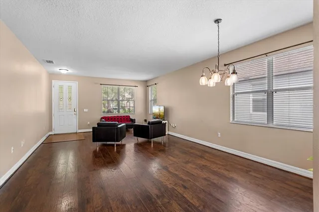 a living room with furniture and window