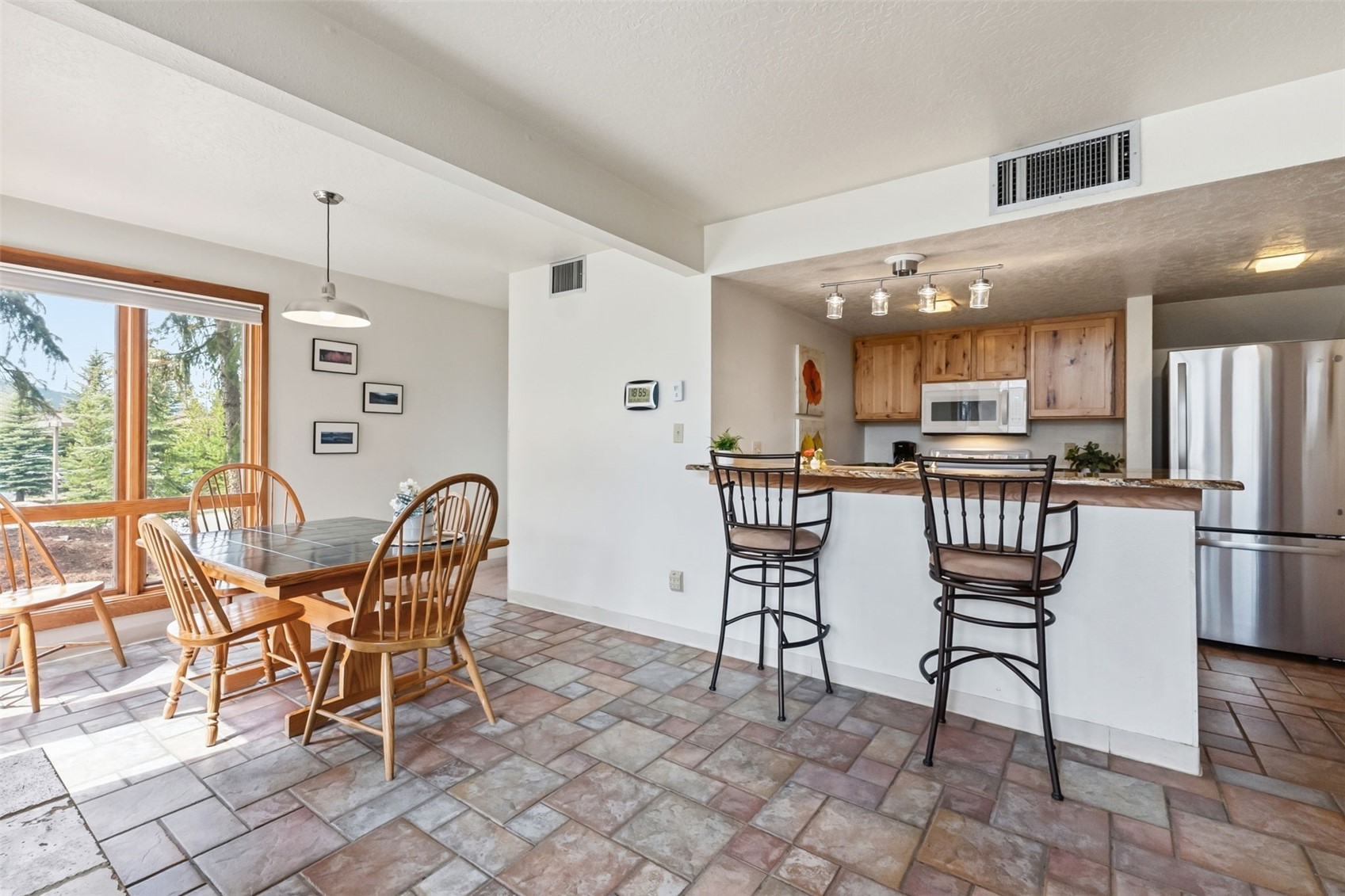 30 Tennis Club Road, Unit 1608 Keystone, CO 80435 - Photo 5 of 29 a view of a dining room kitchen and furniture