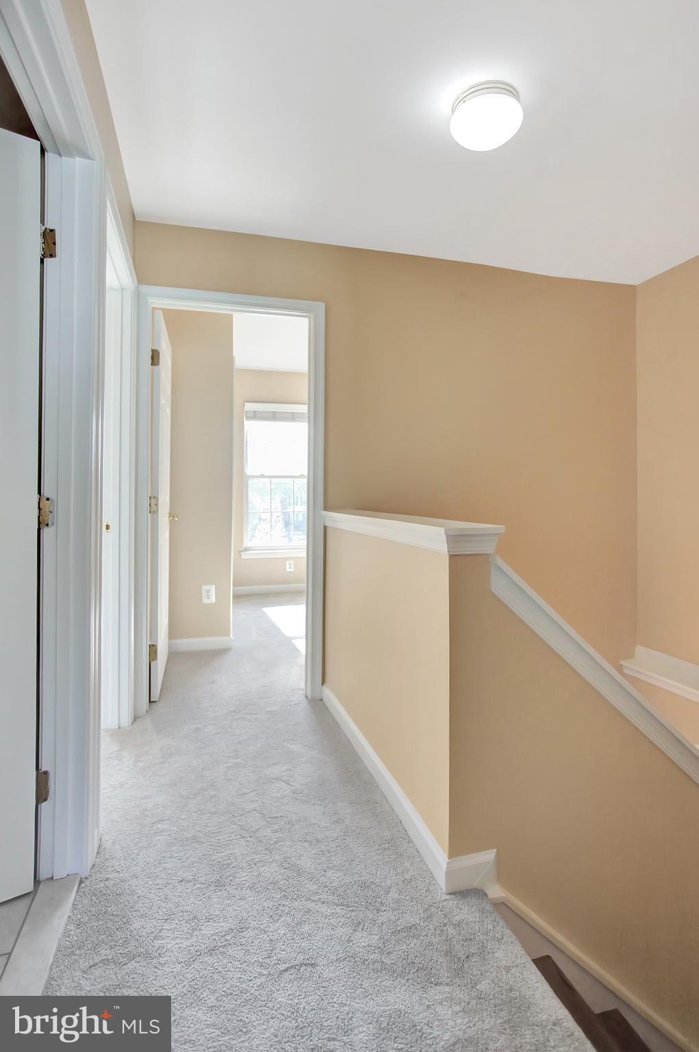 6496 Topsails Lane Springfield, VA 22150 - Photo 18 of 21 Upper Level Hallway With New Carpeting