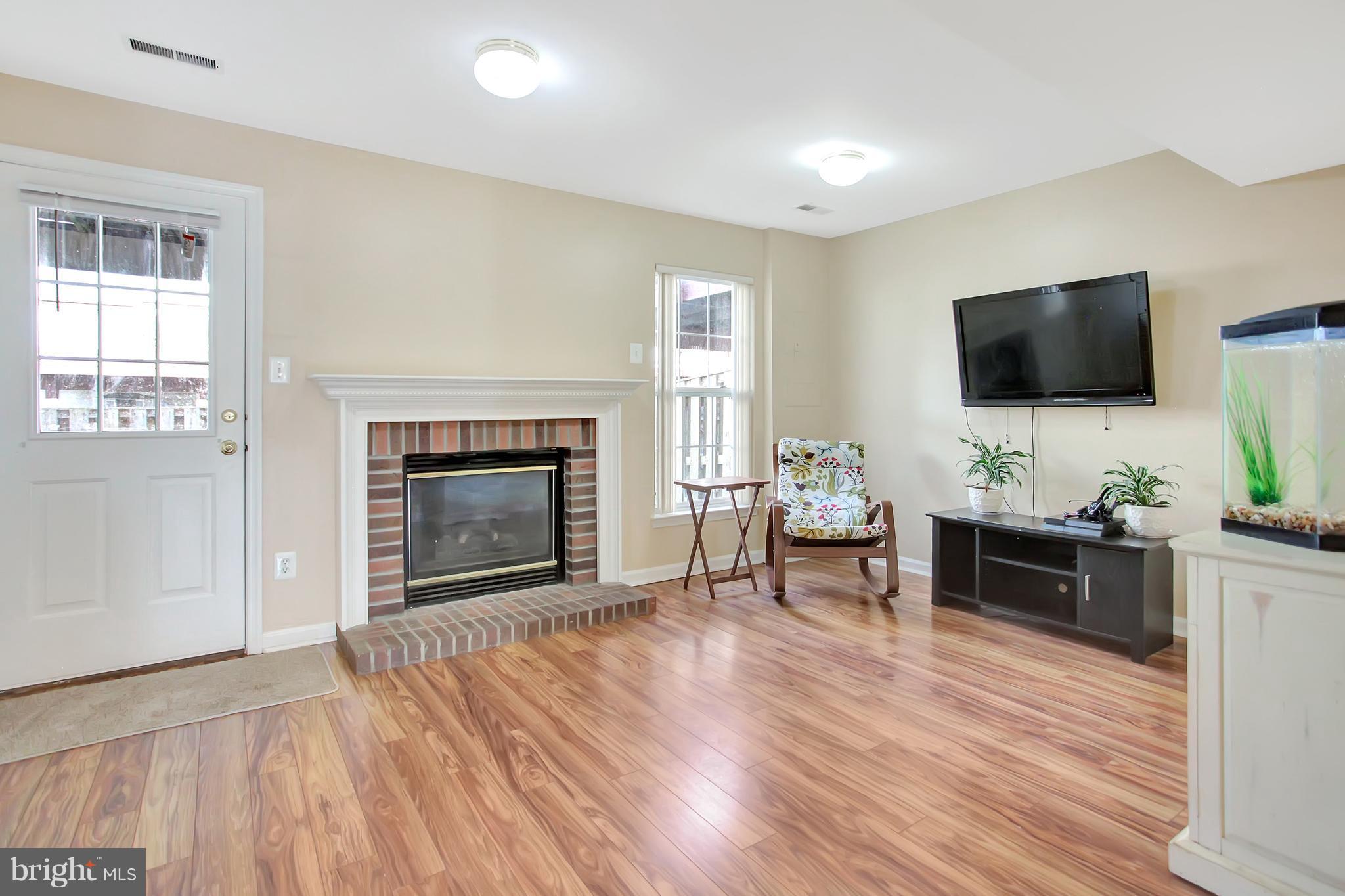 6496 Topsails Lane Springfield, VA 22150 - Photo 4 of 21 Basement Recreation Room Walks Out To Yard