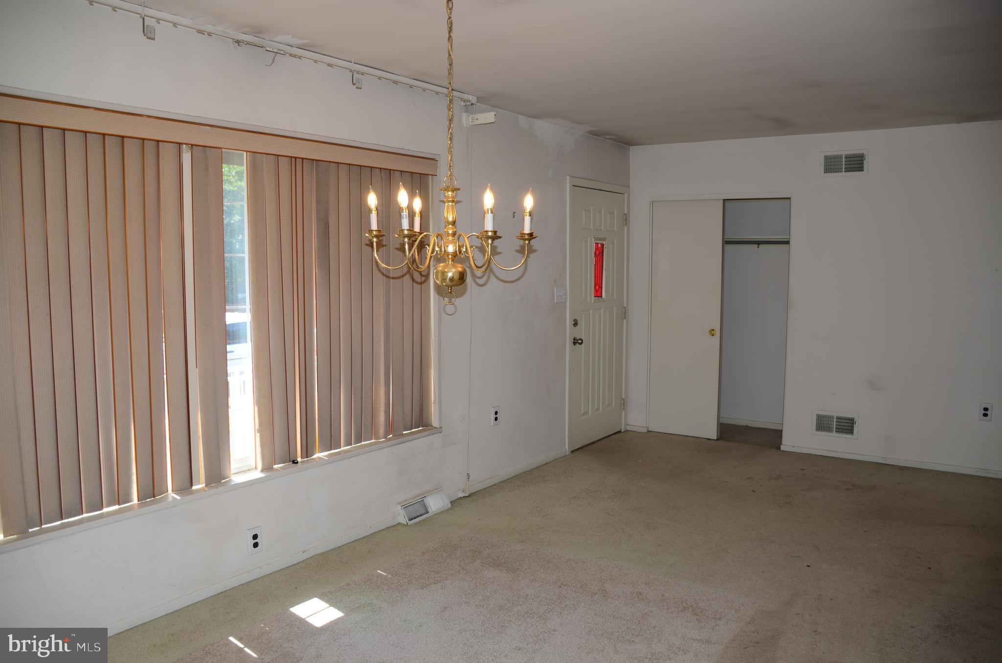 11 Homewood Road Wilmington, DE 19803 - Photo 38 of 47 a view of a hallway with chandelier and entryway