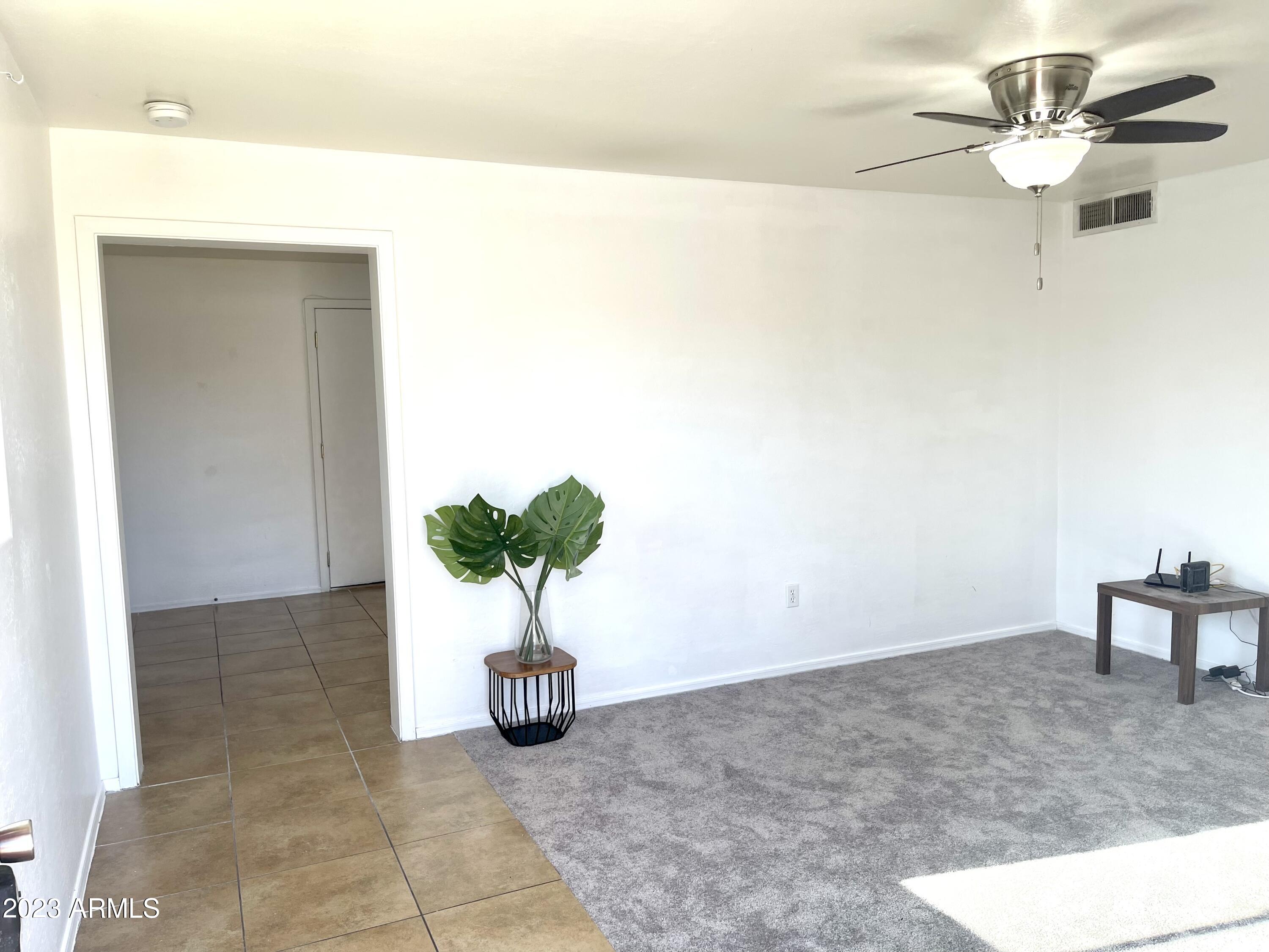 1830 West Chipman Road Phoenix, AZ 85041 - Photo 4 of 19 DCC800BD-71ED-495B-B2D5-0FAEB64C952F