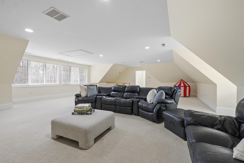 58 Buttrick Lane Carlisle, MA 01741 - Photo 36 of 39 a living room with furniture