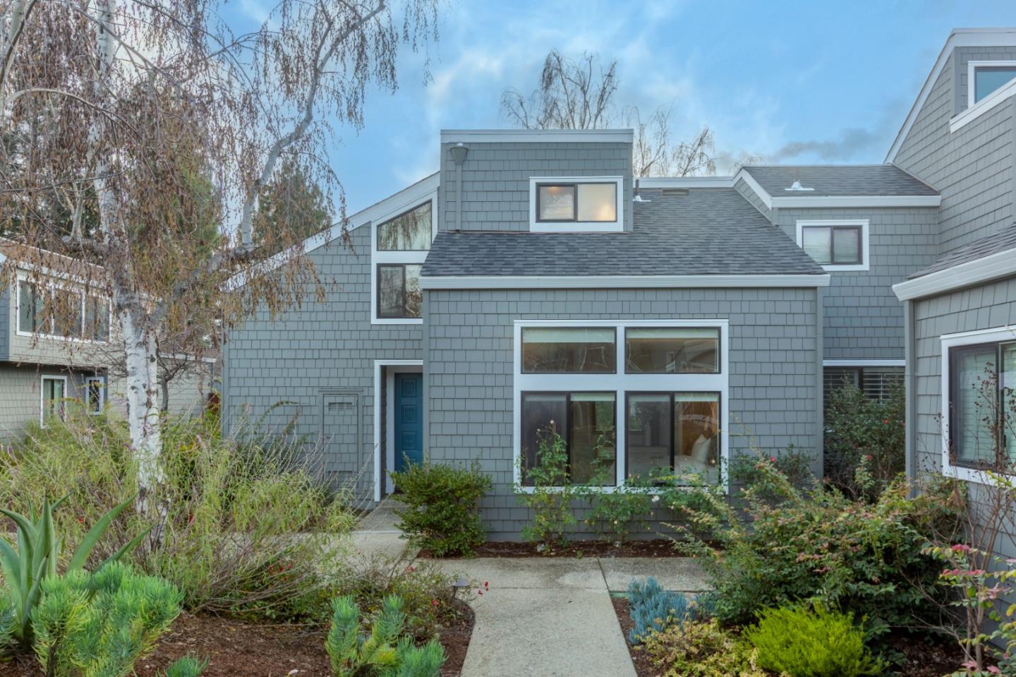 2080 Marich Way, Unit 15 Mountain View, CA 94040 - Photo 1 of 38 a front view of a house with garden