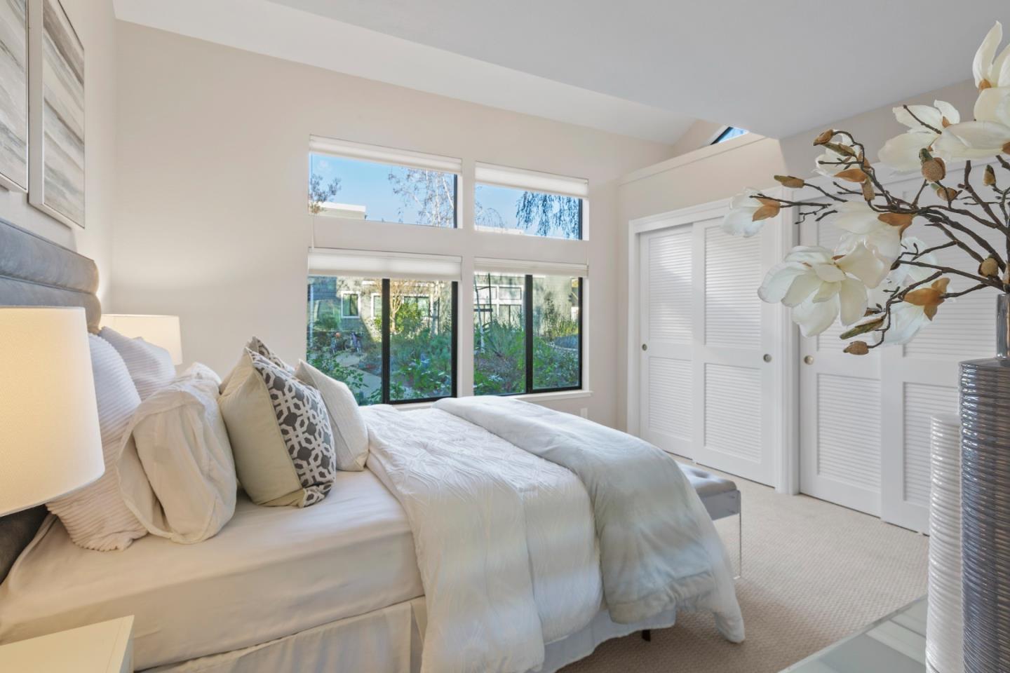 2080 Marich Way, Unit 15 Mountain View, CA 94040 - Photo 18 of 38 a bedroom with a bed and a window