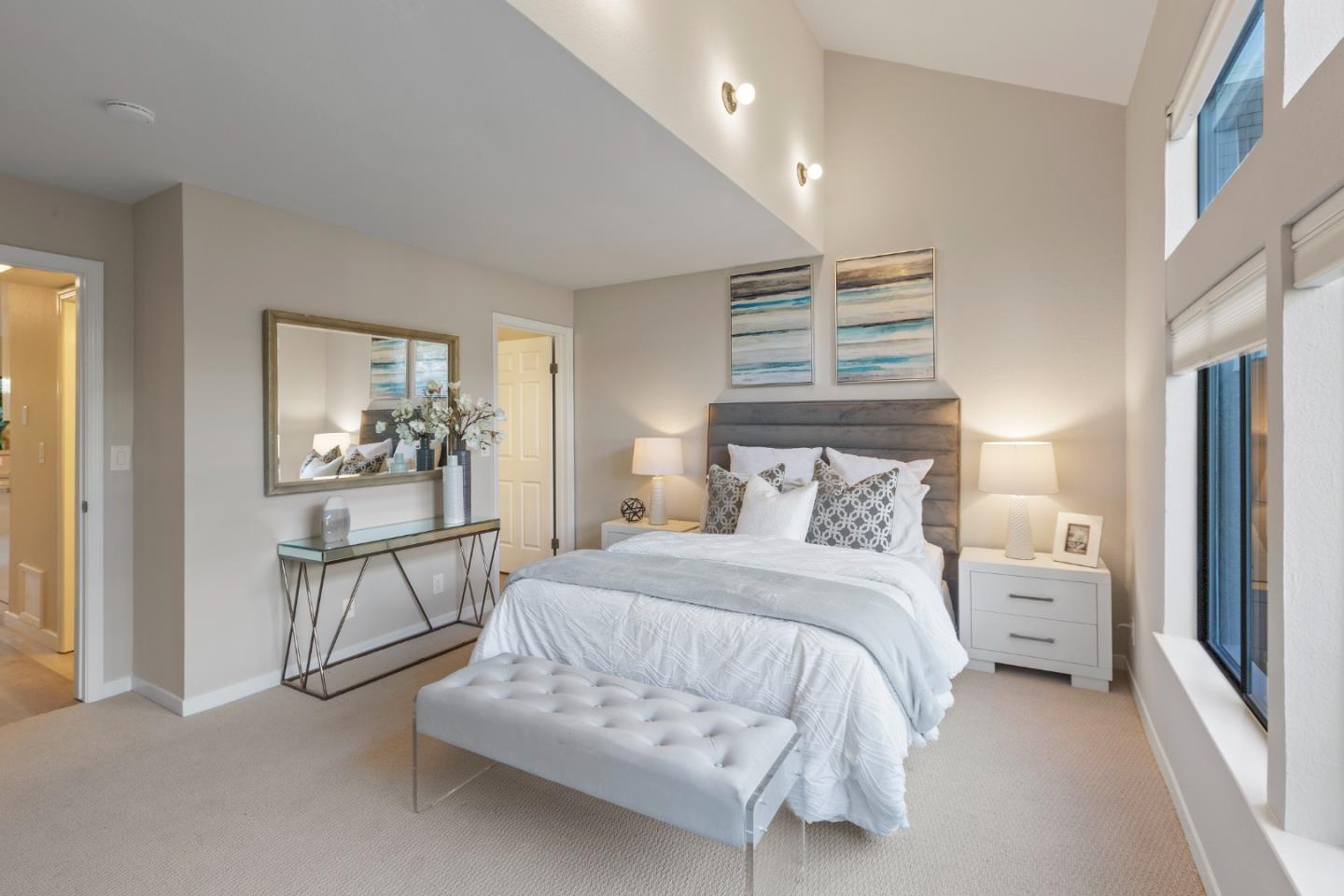 2080 Marich Way, Unit 15 Mountain View, CA 94040 - Photo 19 of 38 a bedroom with a bed and a table