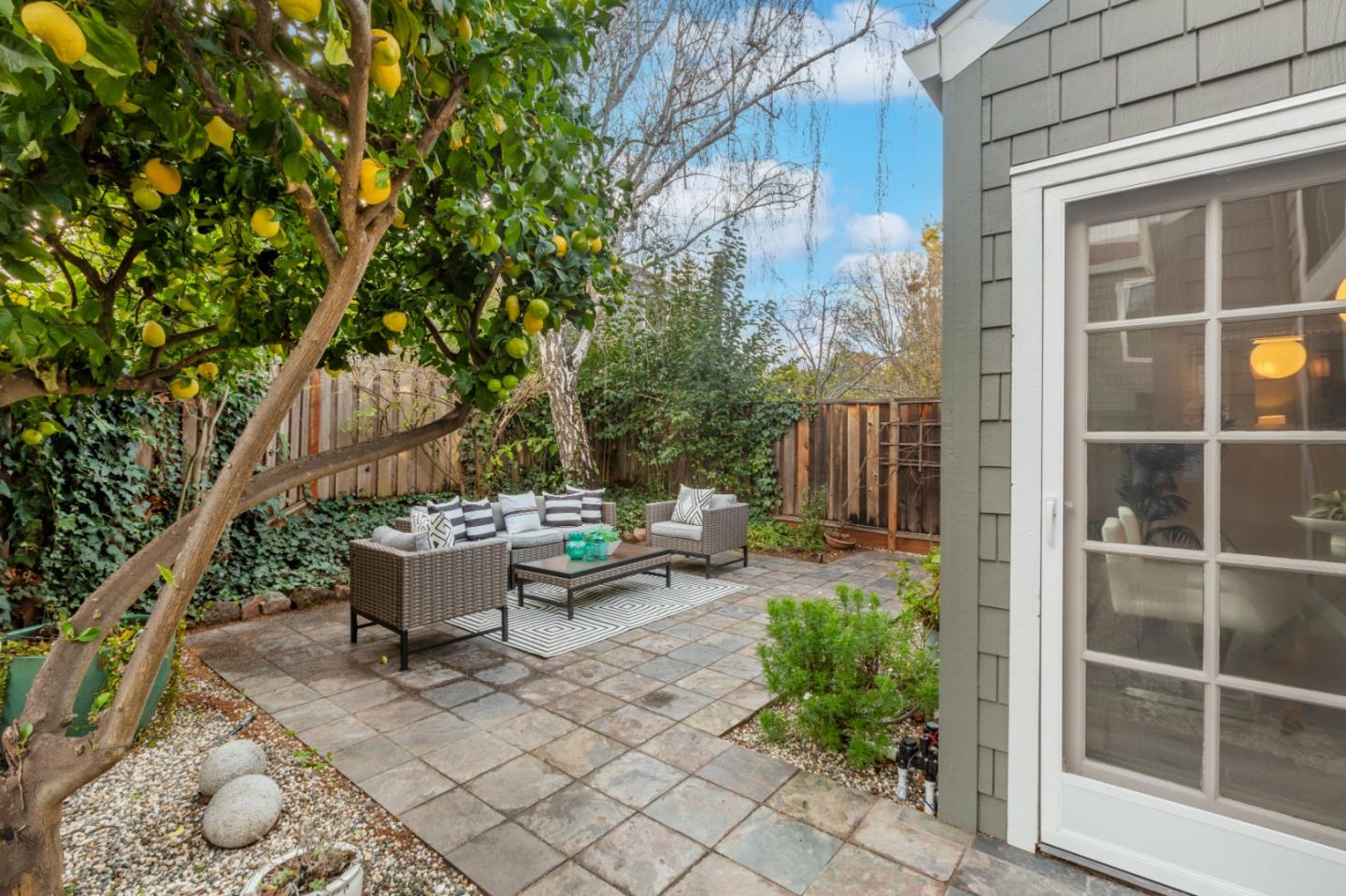2080 Marich Way, Unit 15 Mountain View, CA 94040 - Photo 30 of 38 a view of backyard of house with outdoor seating