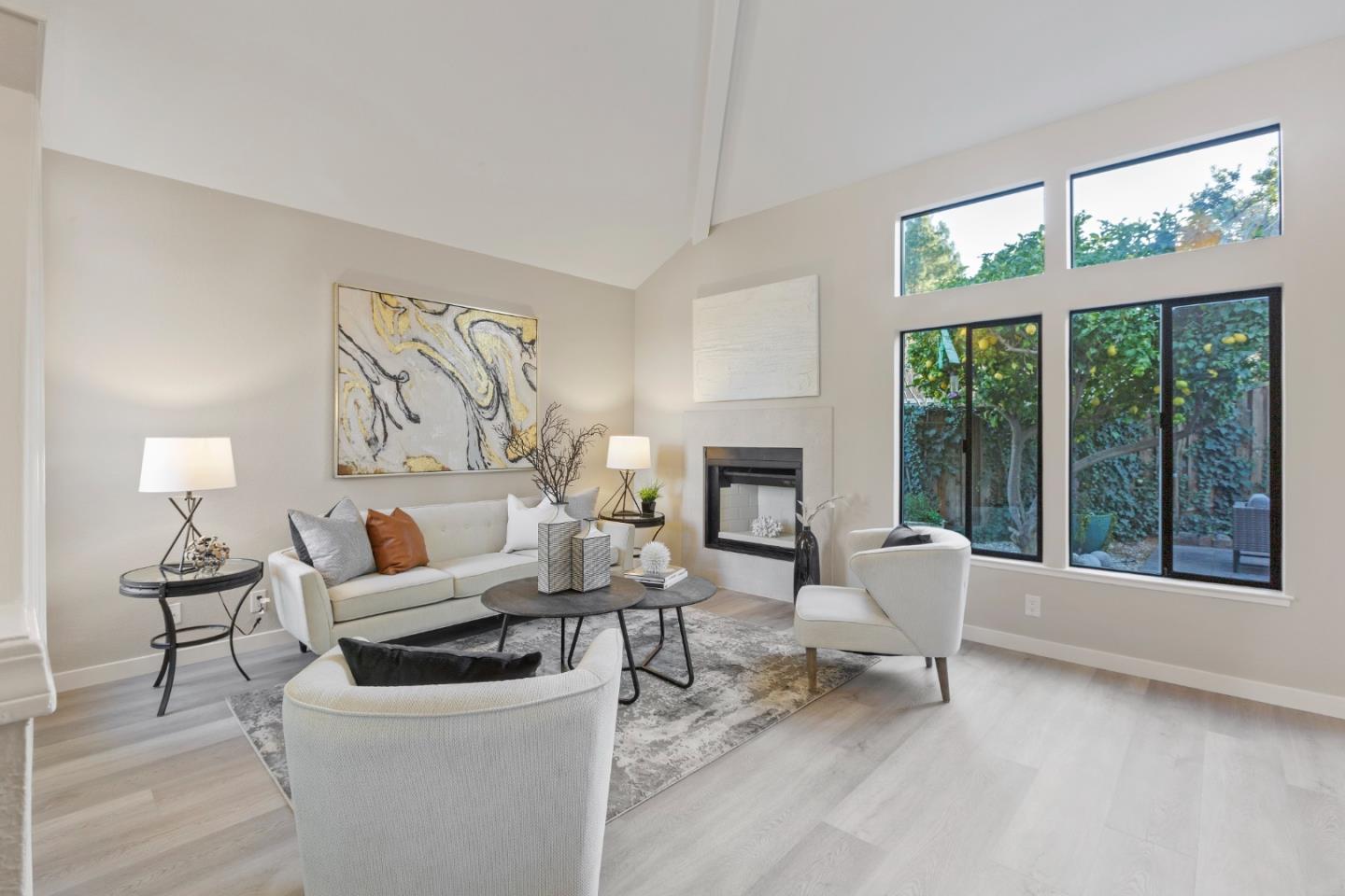 2080 Marich Way, Unit 15 Mountain View, CA 94040 - Photo 6 of 38 a living room with furniture and a fireplace