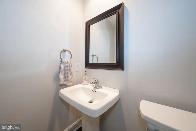 a bedroom with a bed and walk in closet