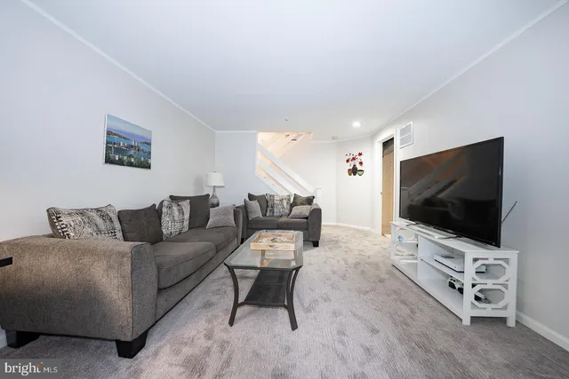 a bedroom with a bed and a mirror