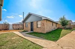 a view of a back yard of the house