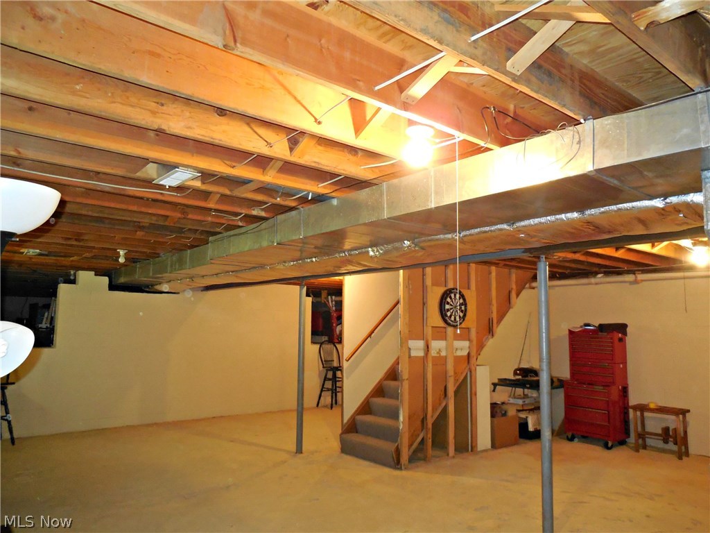 34780 Pettibone Road Solon, OH 44139 - Photo 13 of 17 Large basement area with crawl space, great for storage or could be finished.