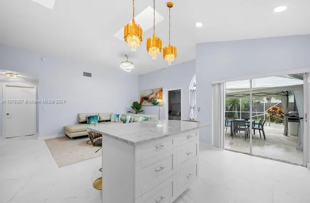 a room with a table and chairs