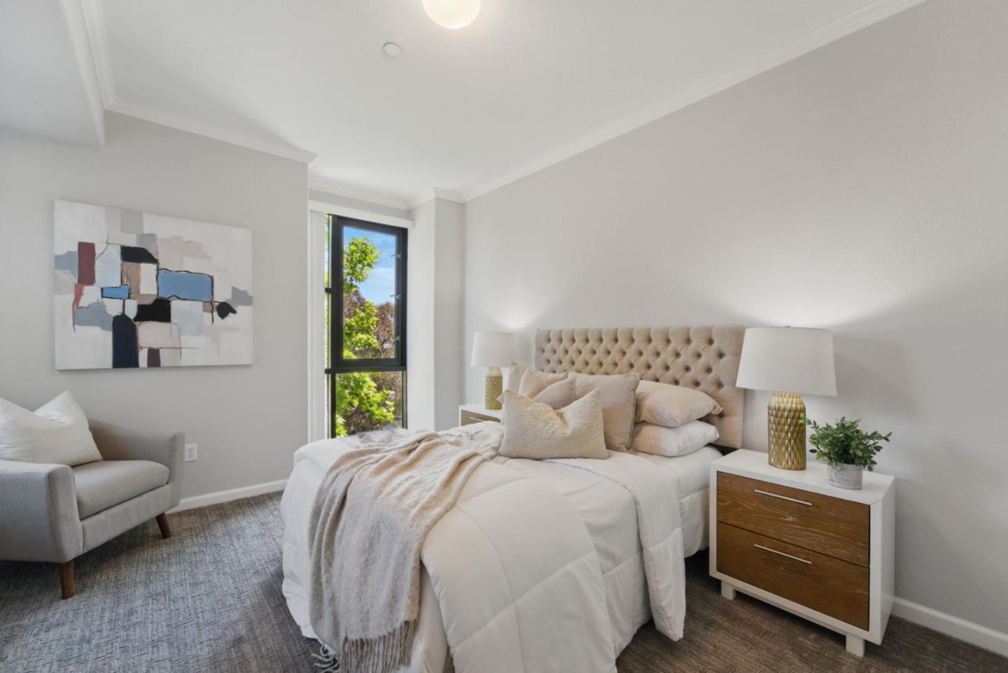 1388 Broadway, Unit 328 Millbrae, CA 94030 - Photo 12 of 25 a bedroom with a bed and a couch