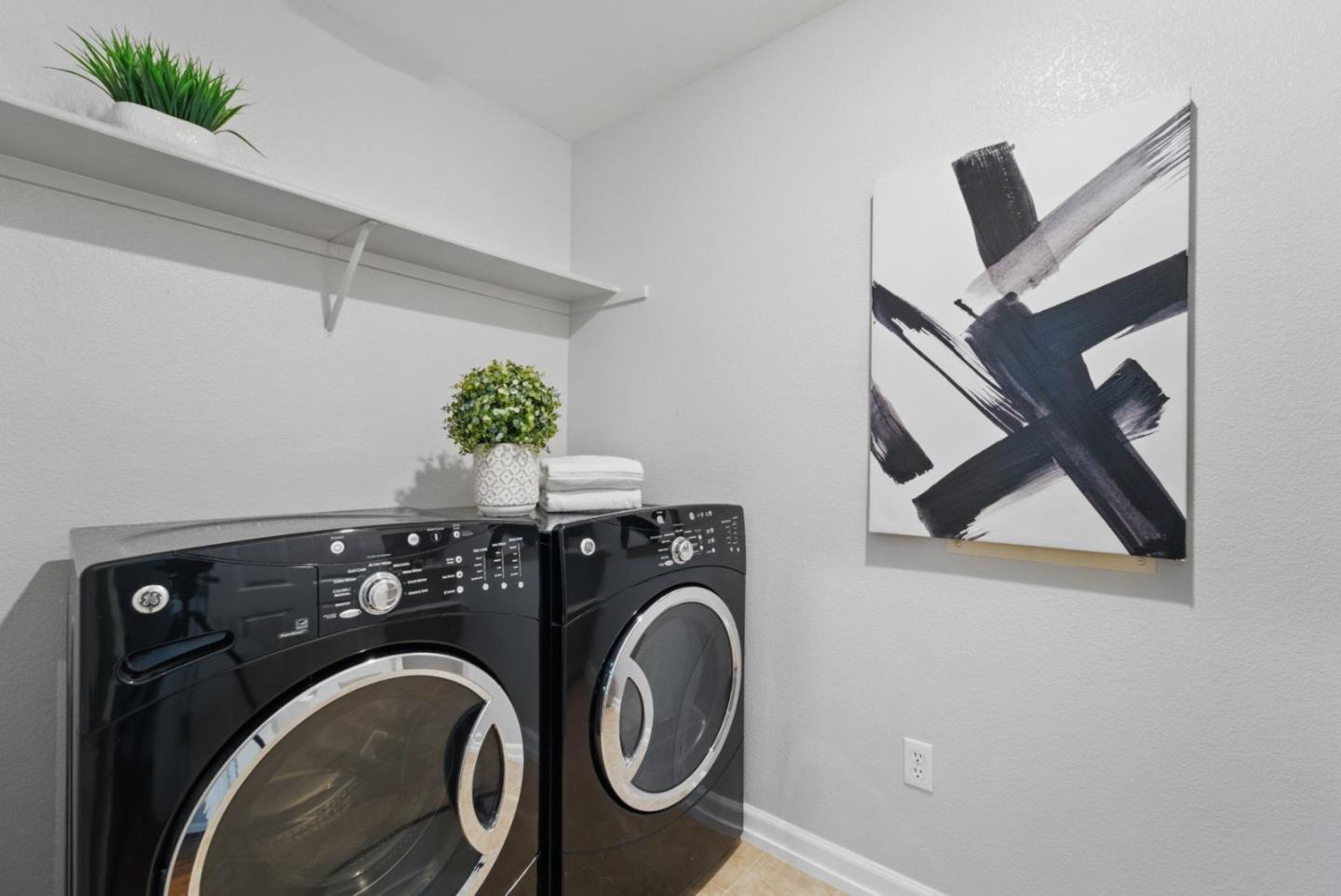 1388 Broadway, Unit 328 Millbrae, CA 94030 - Photo 18 of 25 a utility room with dryer and washer