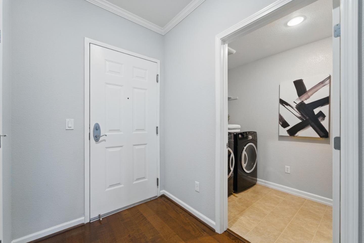 1388 Broadway, Unit 328 Millbrae, CA 94030 - Photo 19 of 25 a view of a storage & utility room with a washer