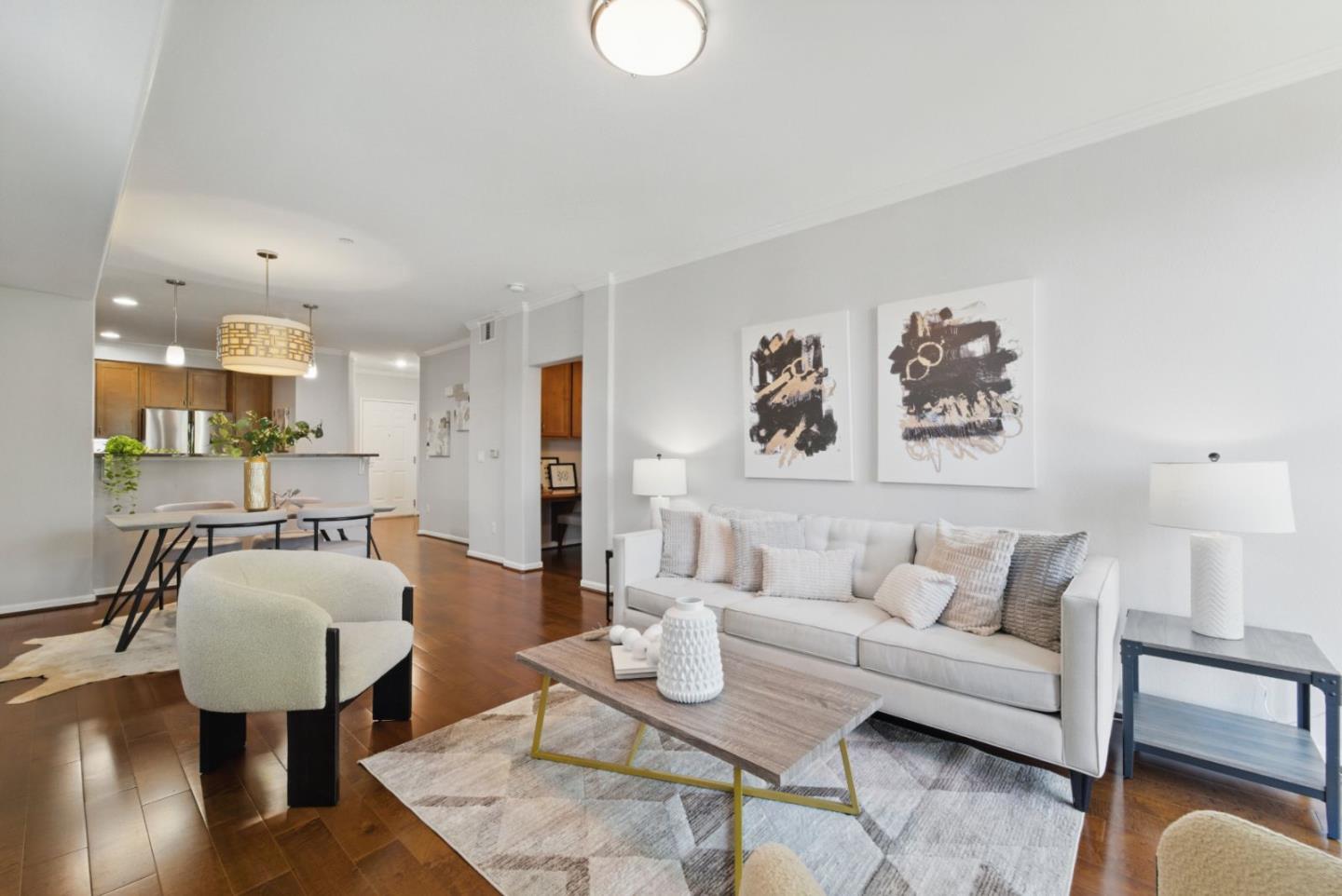 1388 Broadway, Unit 328 Millbrae, CA 94030 - Photo 2 of 25 a living room with furniture and a wooden floor