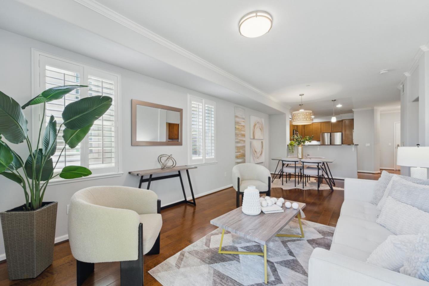 1388 Broadway, Unit 328 Millbrae, CA 94030 - Photo 3 of 25 a living room with furniture and wooden floor