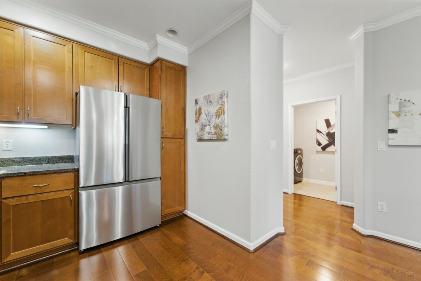 1388 Broadway, Unit 328 Millbrae, CA 94030 - Photo 8 of 25 a kitchen with stainless steel appliances a refrigerator and a sink