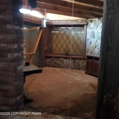 a view of a backyard with sitting area