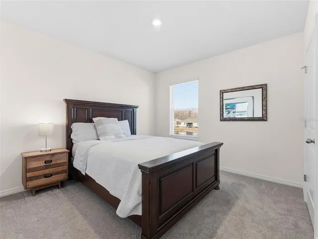 a bathroom with a shower and a bath tub