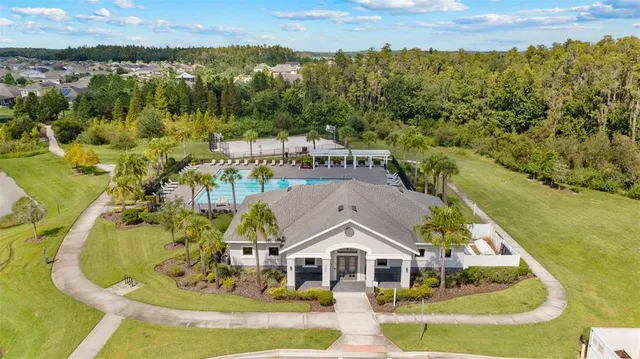 a house view with a backyard space