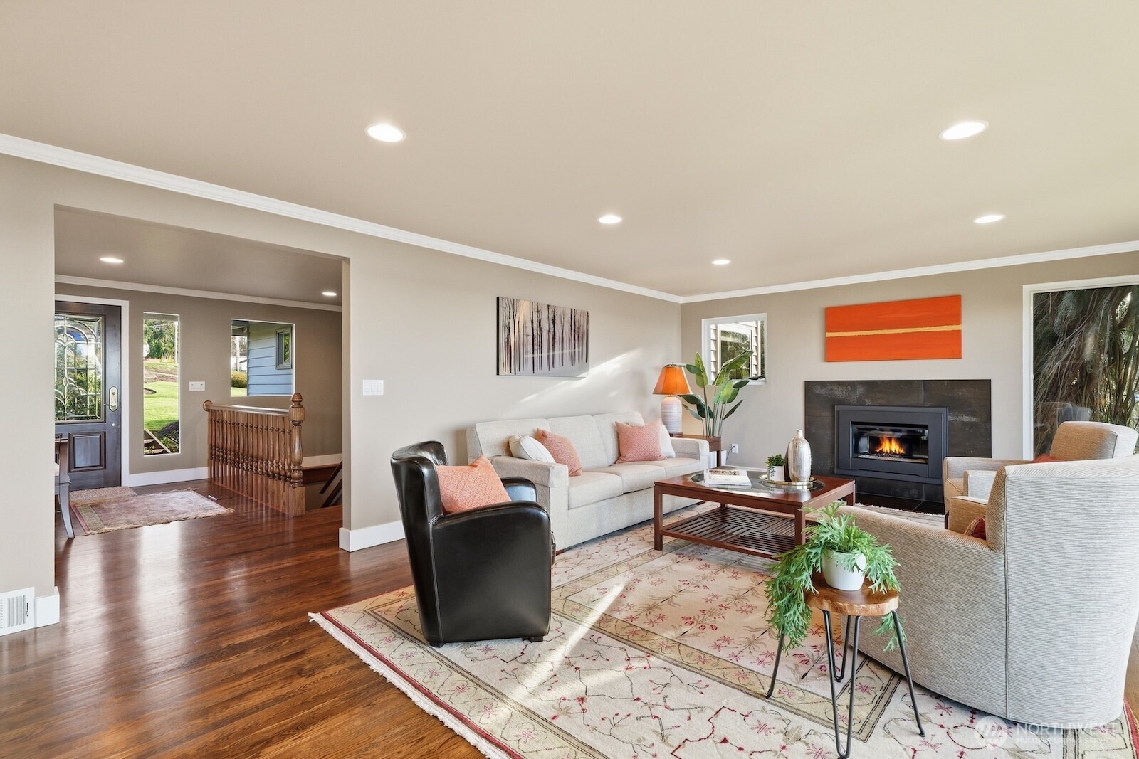 5311 Sound Avenue Everett, WA 98203 - Photo 12 of 40 a living room with fireplace furniture and wooden floor