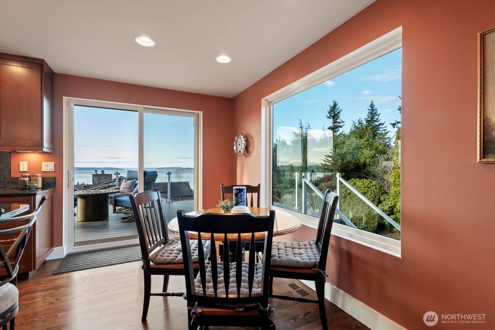 5311 Sound Avenue Everett, WA 98203 - Photo 19 of 40 a dining room with furniture and wooden floor