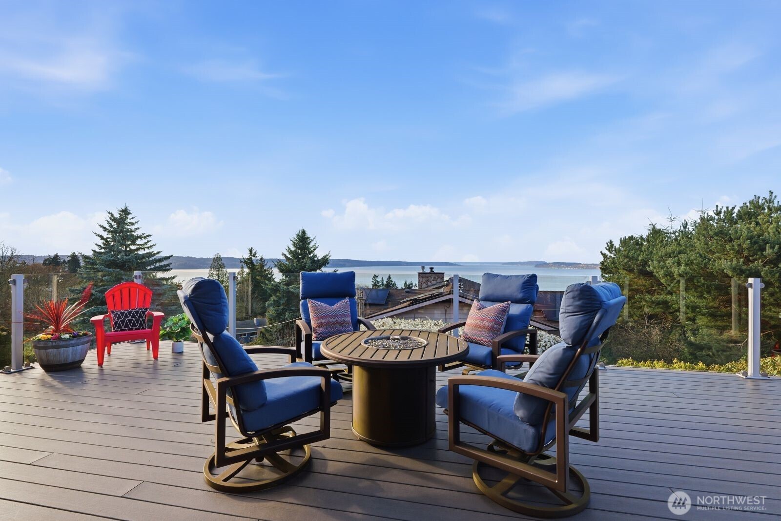 5311 Sound Avenue Everett, WA 98203 - Photo 20 of 40 a view of a roof deck with chair and wooden floor