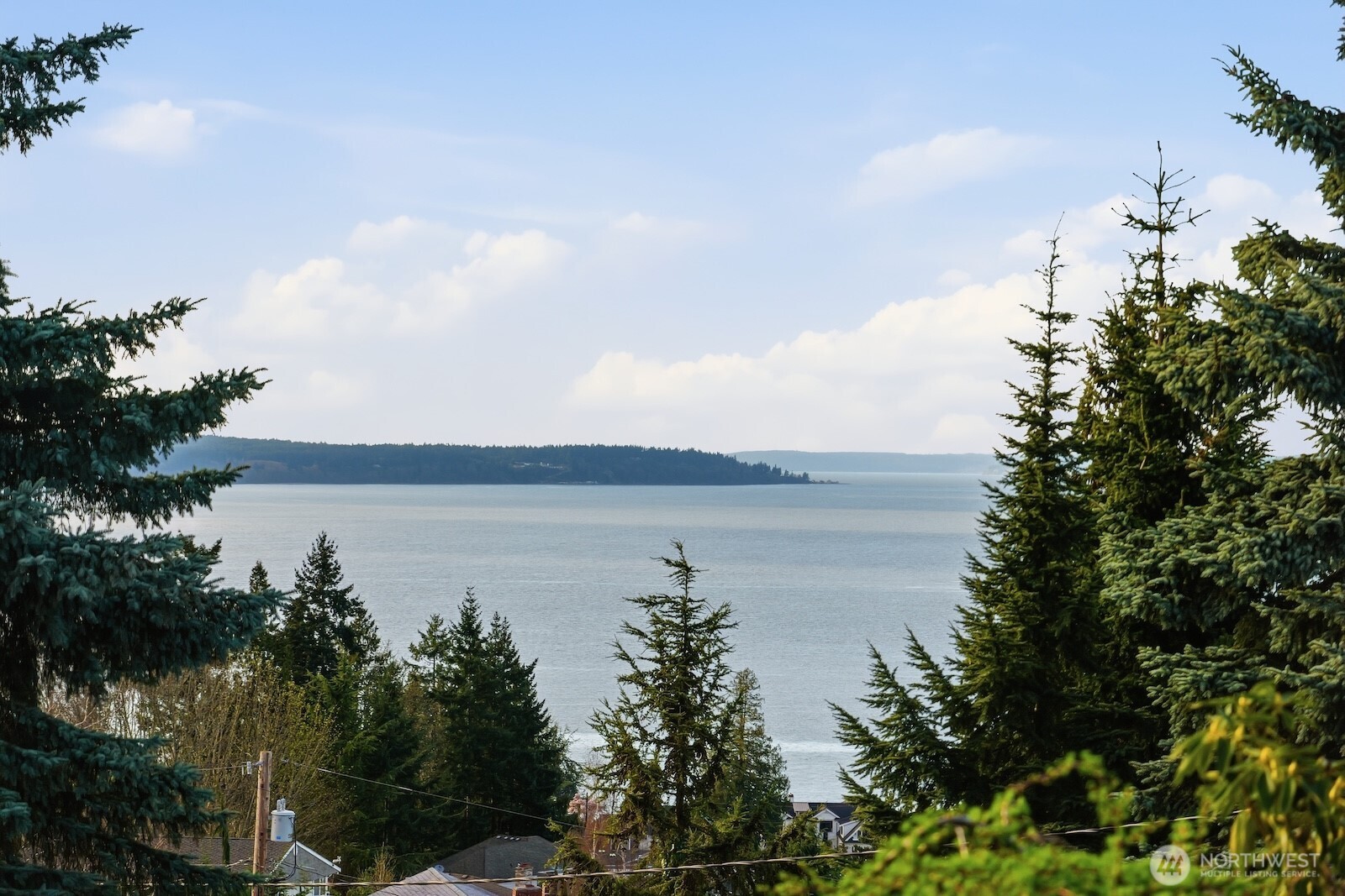 5311 Sound Avenue Everett, WA 98203 - Photo 24 of 40 a view of a lake next to a building