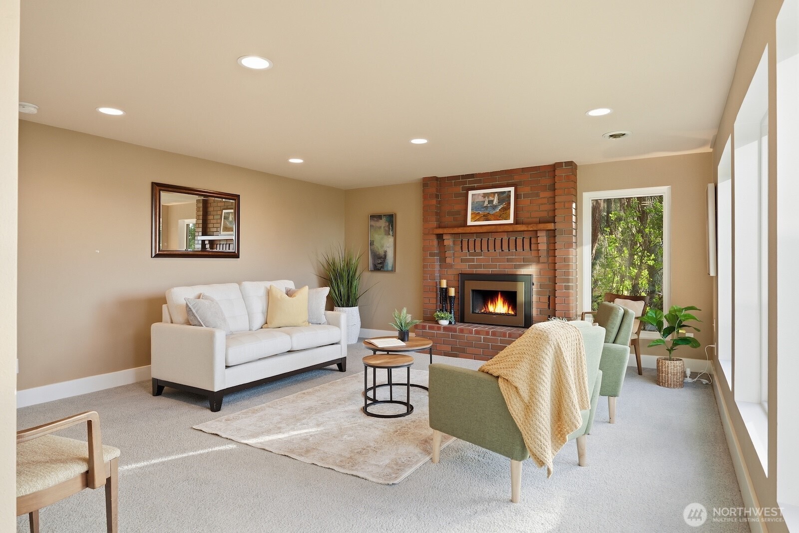 5311 Sound Avenue Everett, WA 98203 - Photo 25 of 40 a living room with furniture and a fireplace