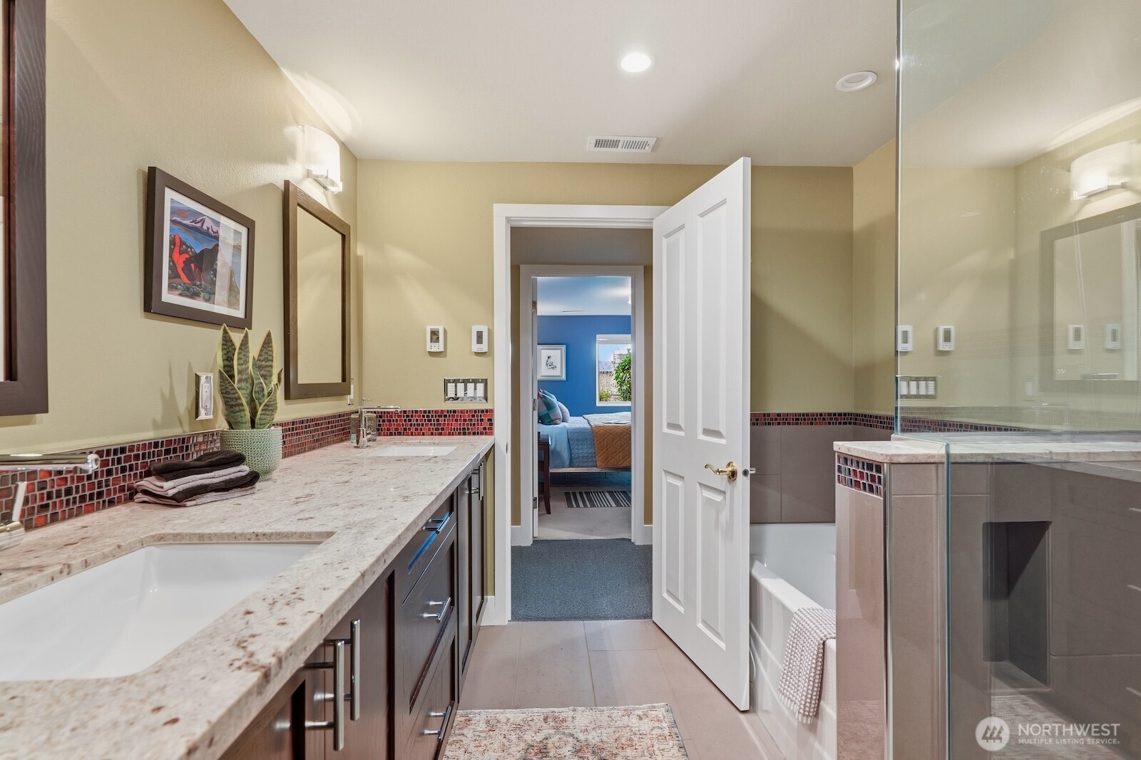 5311 Sound Avenue Everett, WA 98203 - Photo 30 of 40 a bathroom with a granite countertop double vanity sink and a mirror