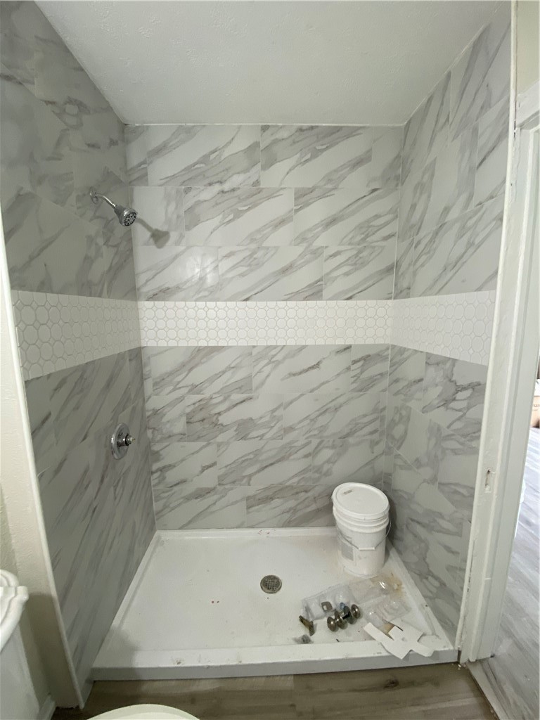 408 East 4th Street Alice, TX 78332 - Photo 5 of 14 a bathroom with a shower