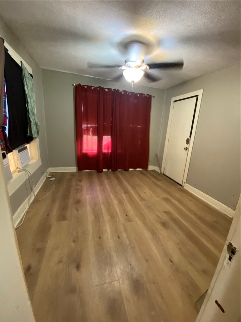 408 East 4th Street Alice, TX 78332 - Photo 10 of 14 a view of empty room with a flat screen tv