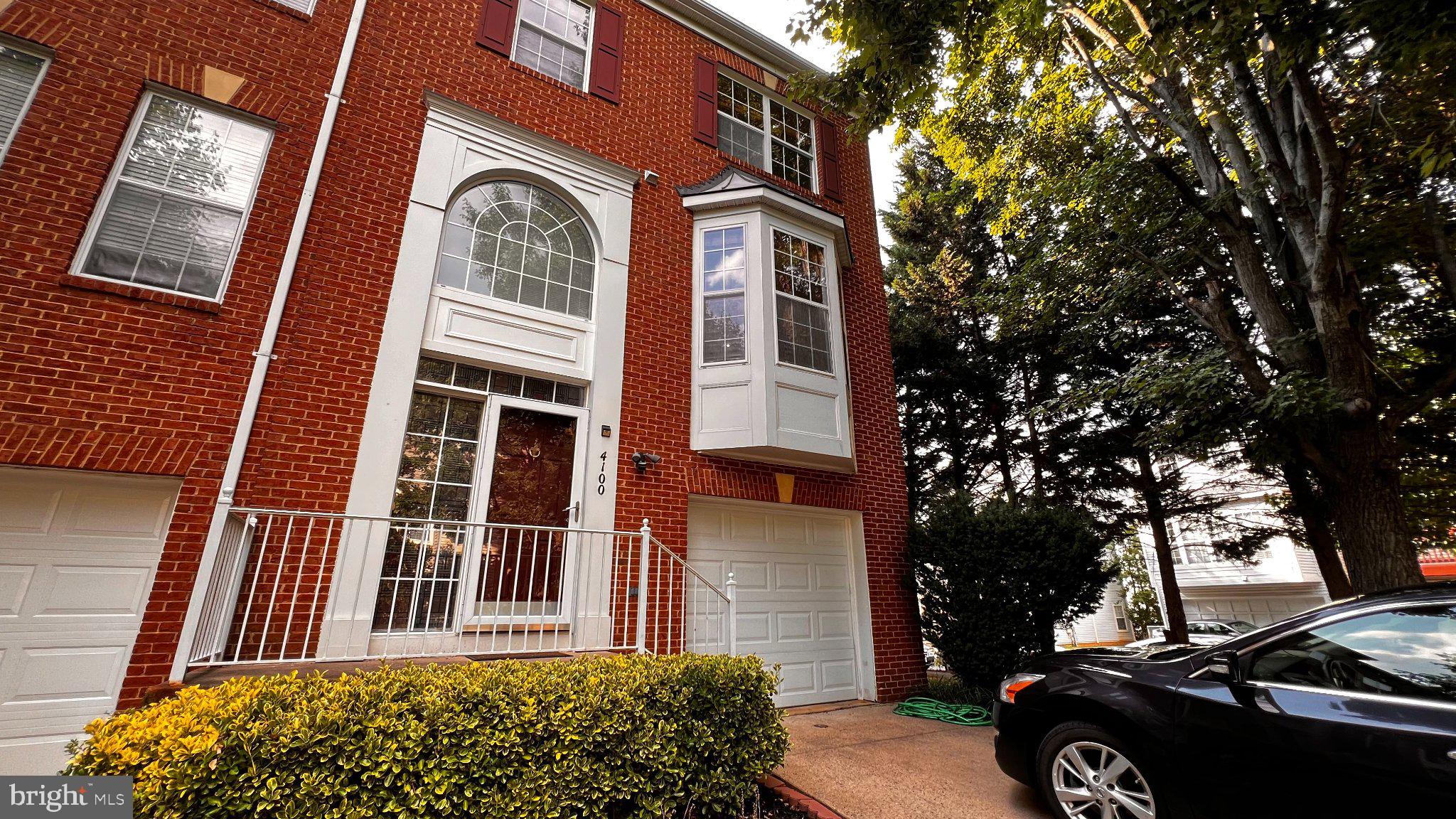 4100 Flower Fairfax, VA 22030 - Photo 1 of 47 front view of a house with a yard