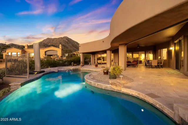 a view of a house with swimming pool