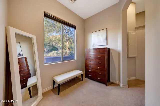 a room with furniture and a window