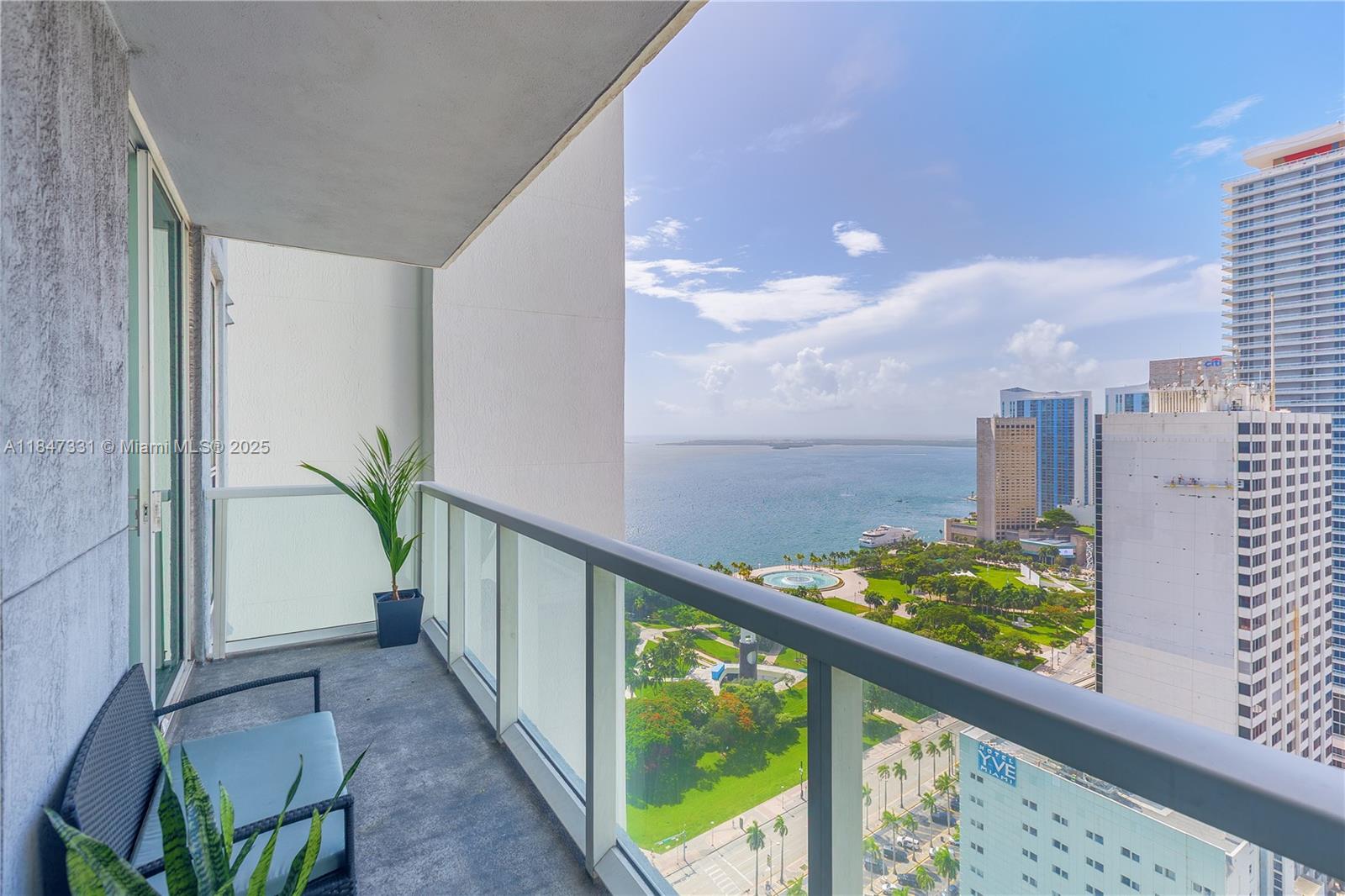 244 Biscayne Boulevard, Unit 3205 Miami, FL 33132 - Photo 1 of 10 a view of balcony with wooden floor