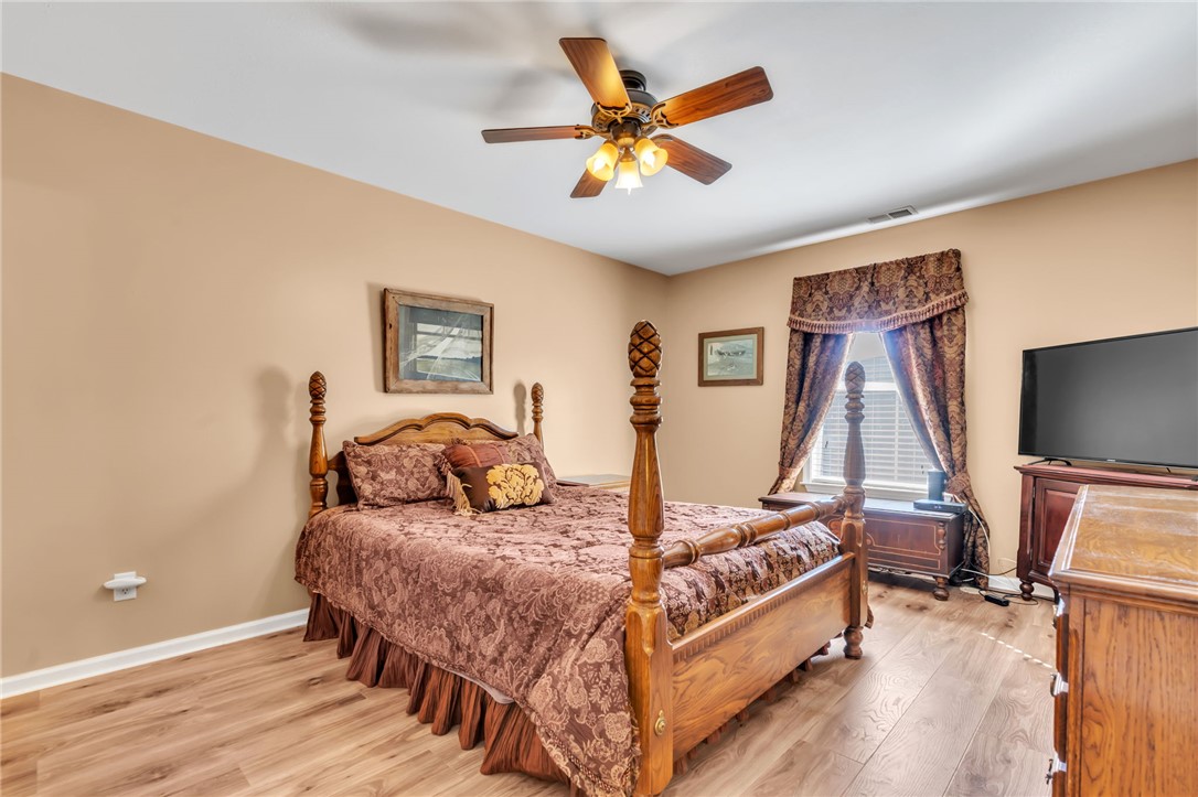 18 Sweetgrass Trail Anderson, SC 29625 - Photo 11 of 26 This cozy bedroom offers comfort and style with warm tones and inviting finishes.