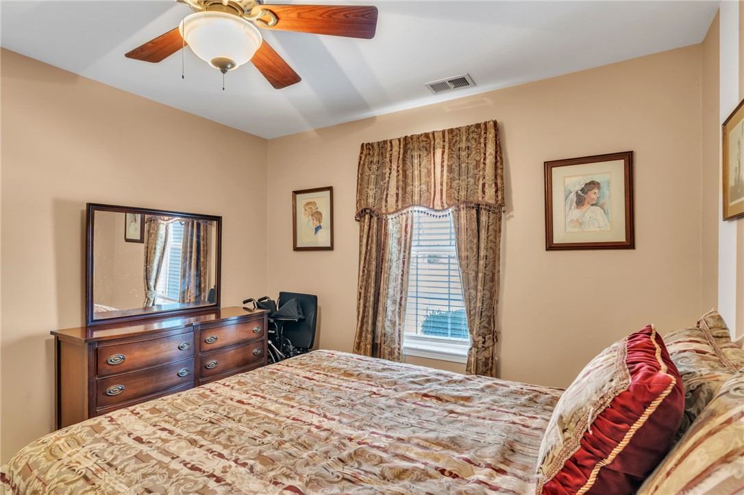 18 Sweetgrass Trail Anderson, SC 29625 - Photo 19 of 26 This cozy bedroom offers a serene retreat with ample natural light.