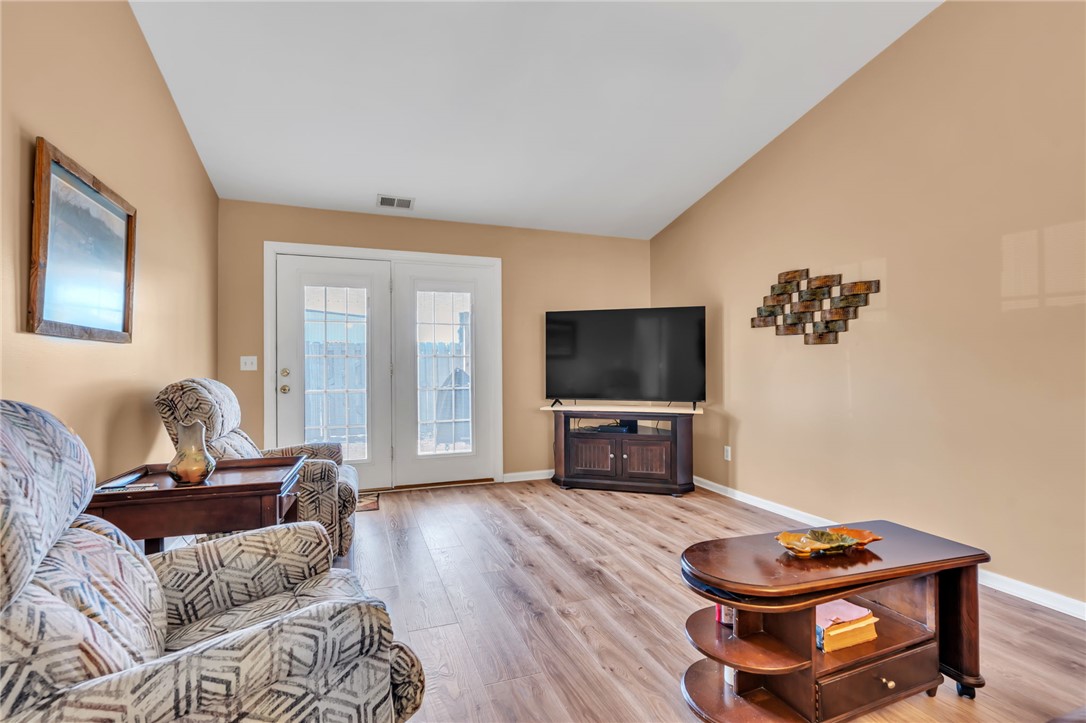 18 Sweetgrass Trail Anderson, SC 29625 - Photo 4 of 26 This bright living space features durable flooring and convenient outdoor access.