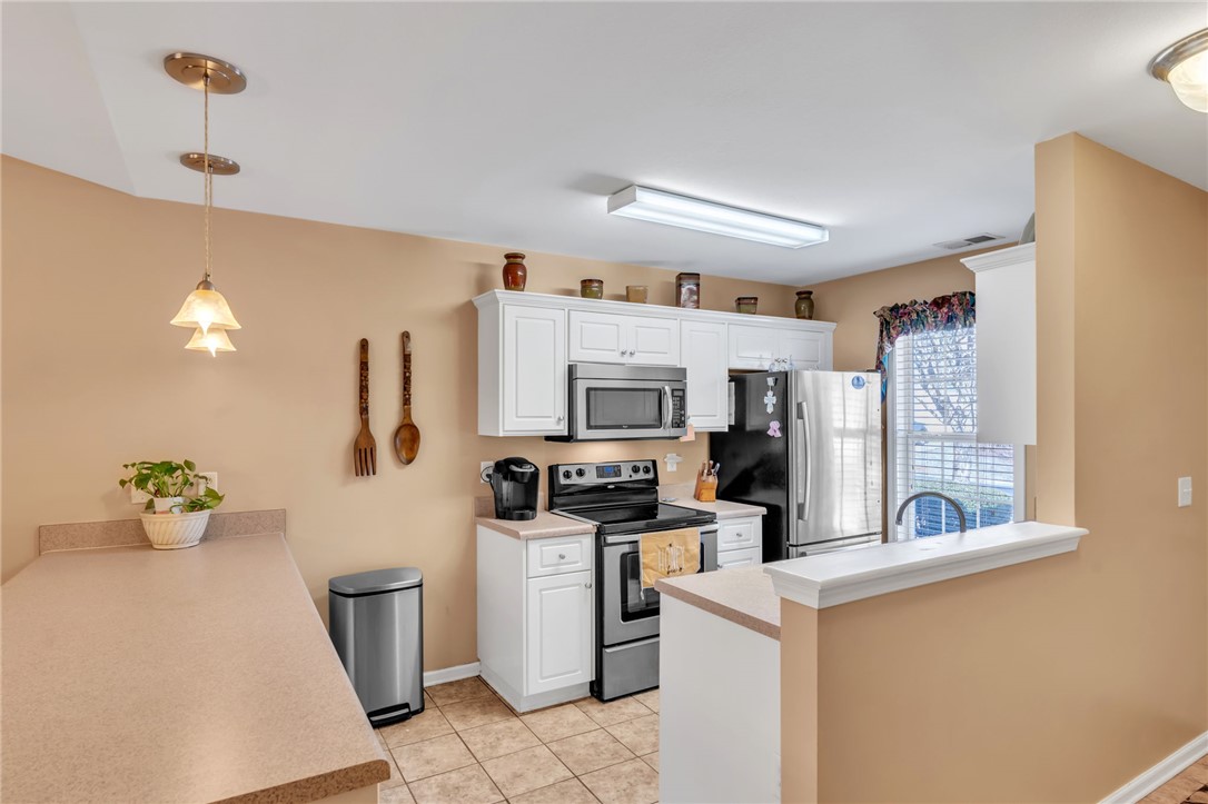 18 Sweetgrass Trail Anderson, SC 29625 - Photo 9 of 26 This functional kitchen features ample counter space and essential appliances for everyday living.