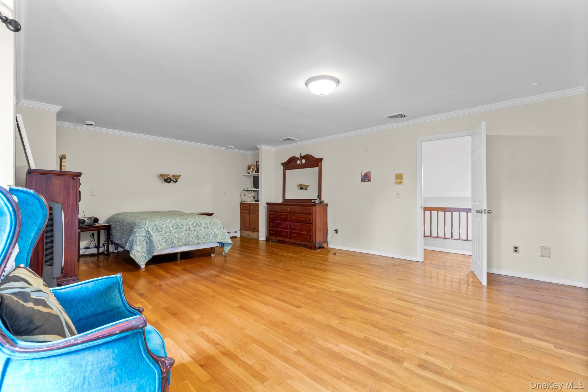 513 Bedford Road Armonk, NY 10504 - Photo 24 of 38 a living room with furniture and a wooden floor